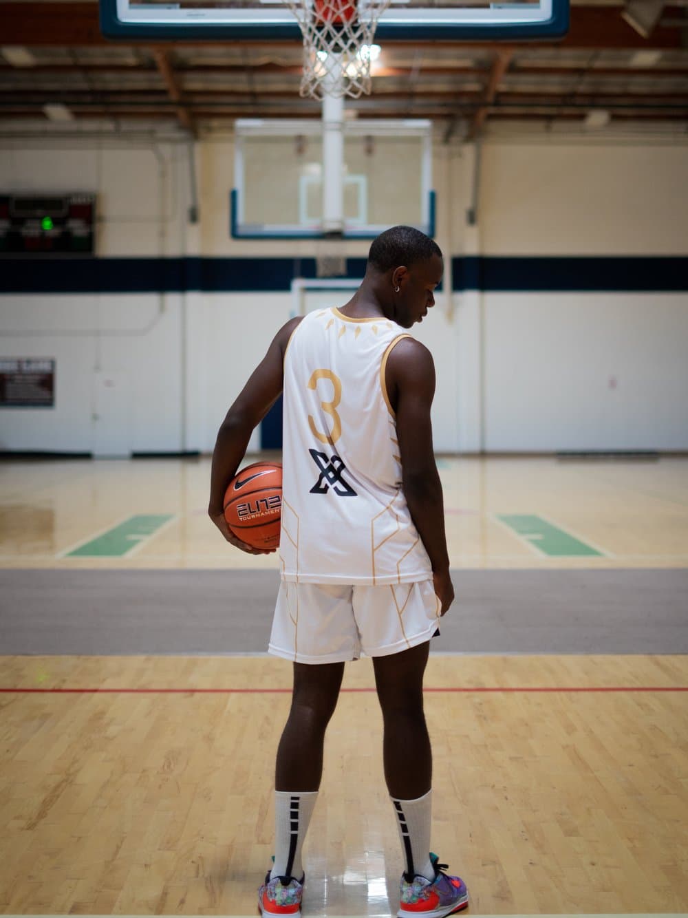 Xima Athletics student-athlete looking down the court